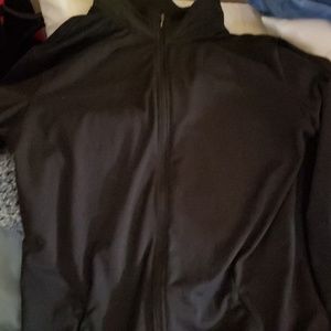 Fila performance jacket Zips all the way up to nec